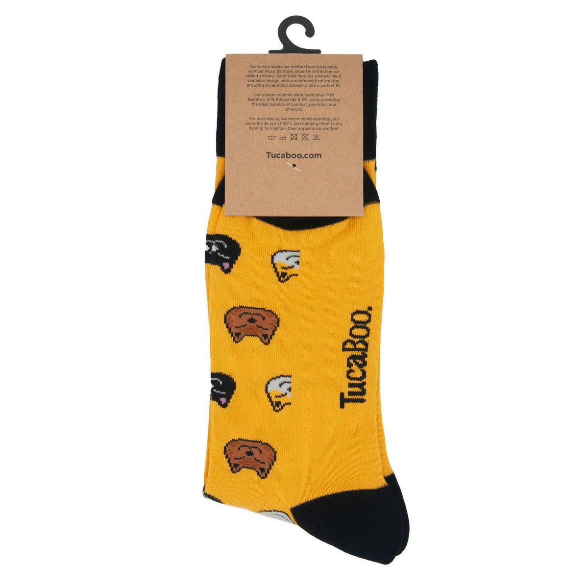 Back of the TucaBoo packaging on mustard yellow cat socks