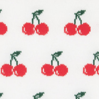 Close-up of the red cherry print on white bamboo