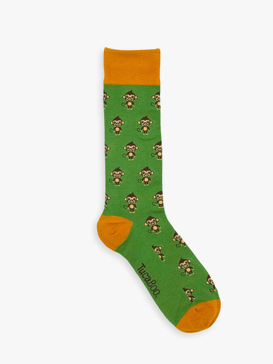 Monkey socks for men: green bamboo socks with brown monkeys and an orange cuff, heel and toe