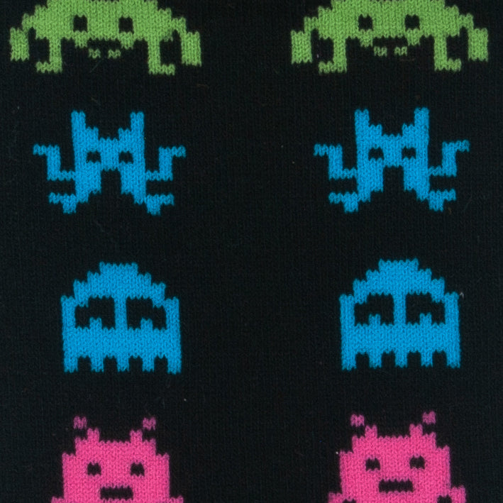 Close-up of the green, blue and pink pixel aliens