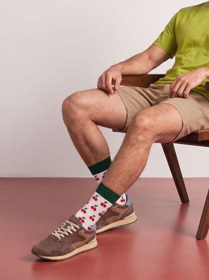Man in shorts wearing white cherry socks