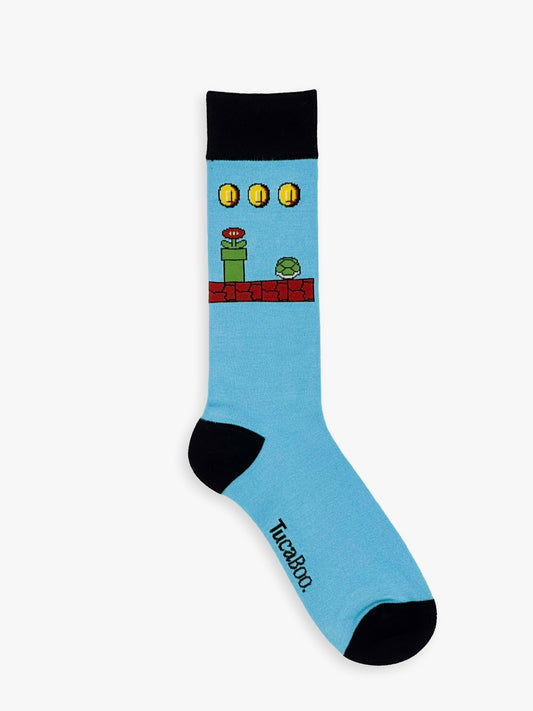 Light blue men's retro gaming socks with a pixel game scene and black heel